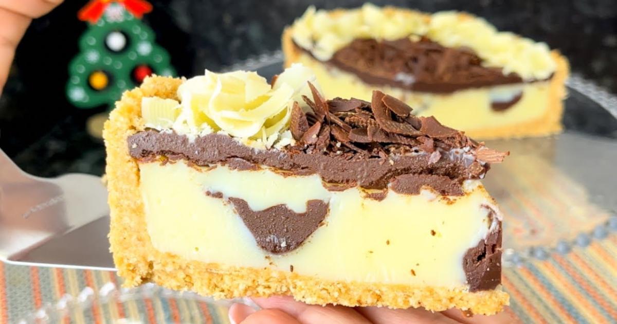 Torta Trufada de Ninho com Chocolate, cremosa, com base de bolacha, recheio e ganache deliciosos....