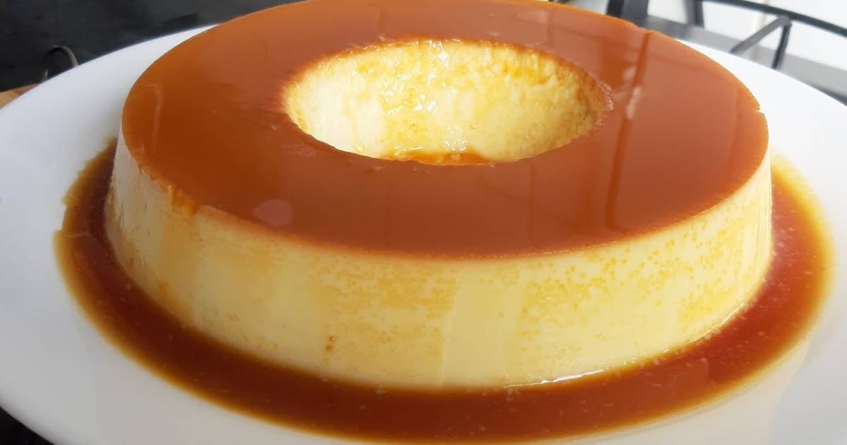 Aprenda a fazer um pudim de leite condensado simples, delicioso e com a calda perfeita....