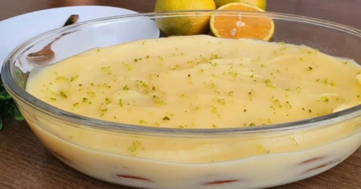 Pavê de laranja fácil, com creme cítrico e camadas de bolacha, perfeito para sobremesas refrescantes....