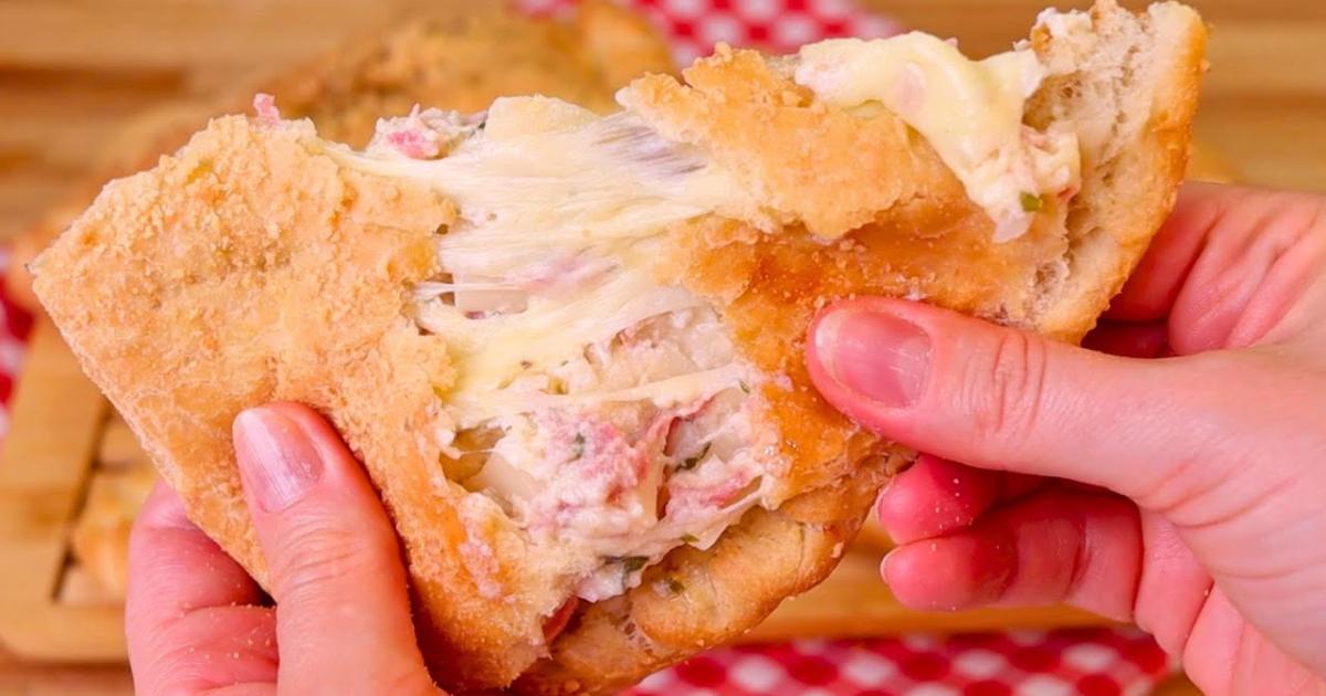 Aprenda a fazer um calzone de palmito com calabresa, com massa crocante e recheio cremoso....