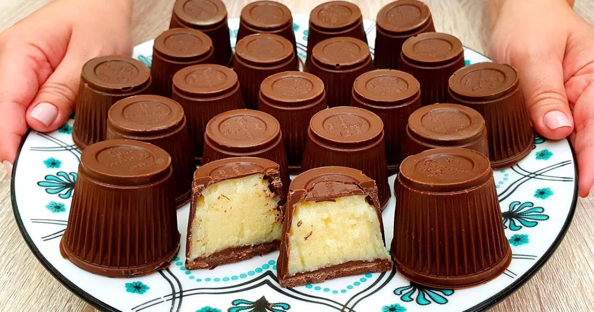 Trufas de 4 ingredientes com recheio de coco e cobertura de chocolate meio amargo....