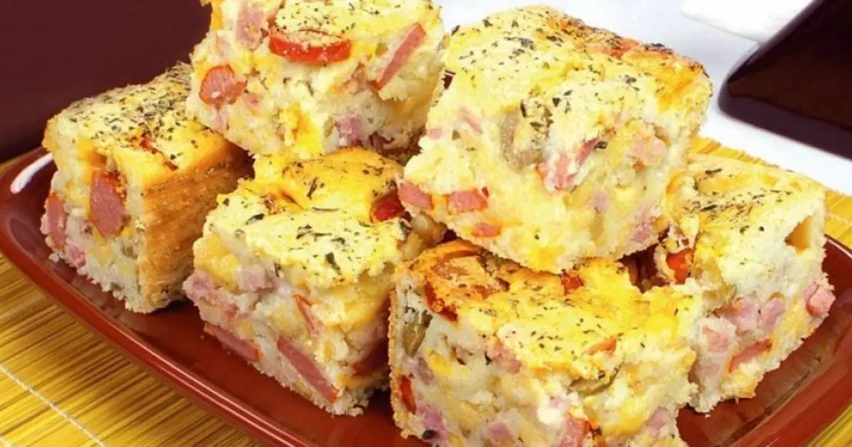 A Torta de Frios Sem Liquidificador Bem Recheada é prática e perfeita para festas ou...