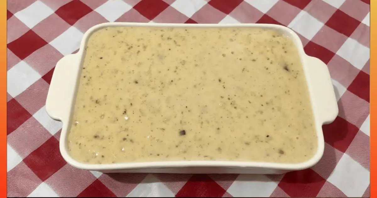 Receita de canjica cremosa com coco e paçoca, perfeita para o arraiá....
